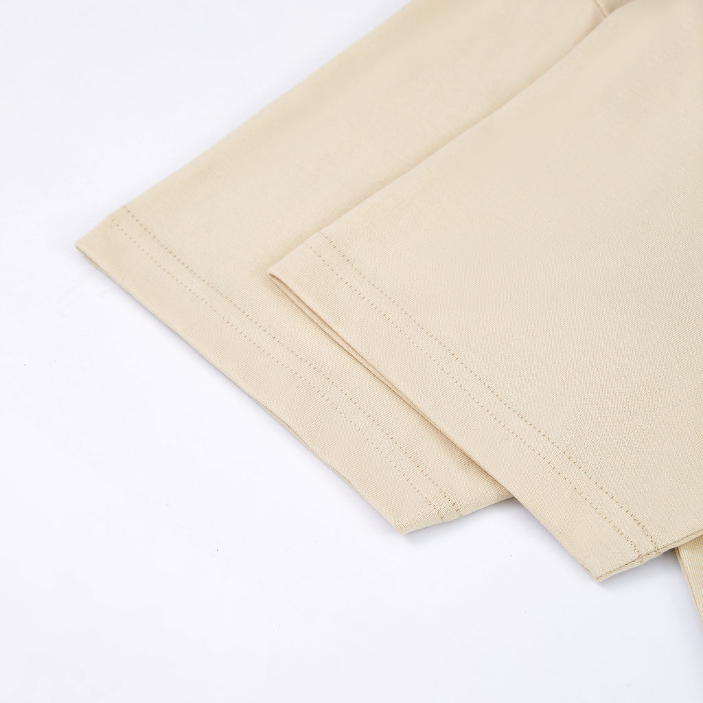Beige fabric with a subtle pattern on a white background